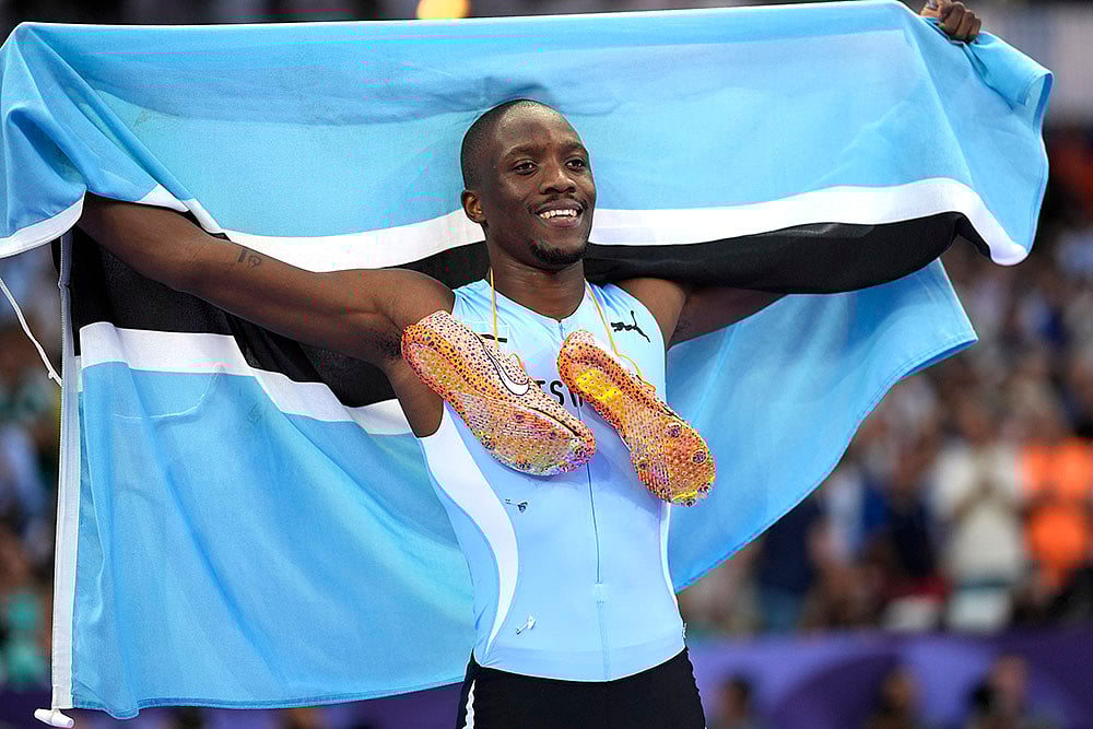 | Photo: AP/Matthias Schrader : Letsile Tebogo, of Botswana, celebrates after winning the men's 200-meter